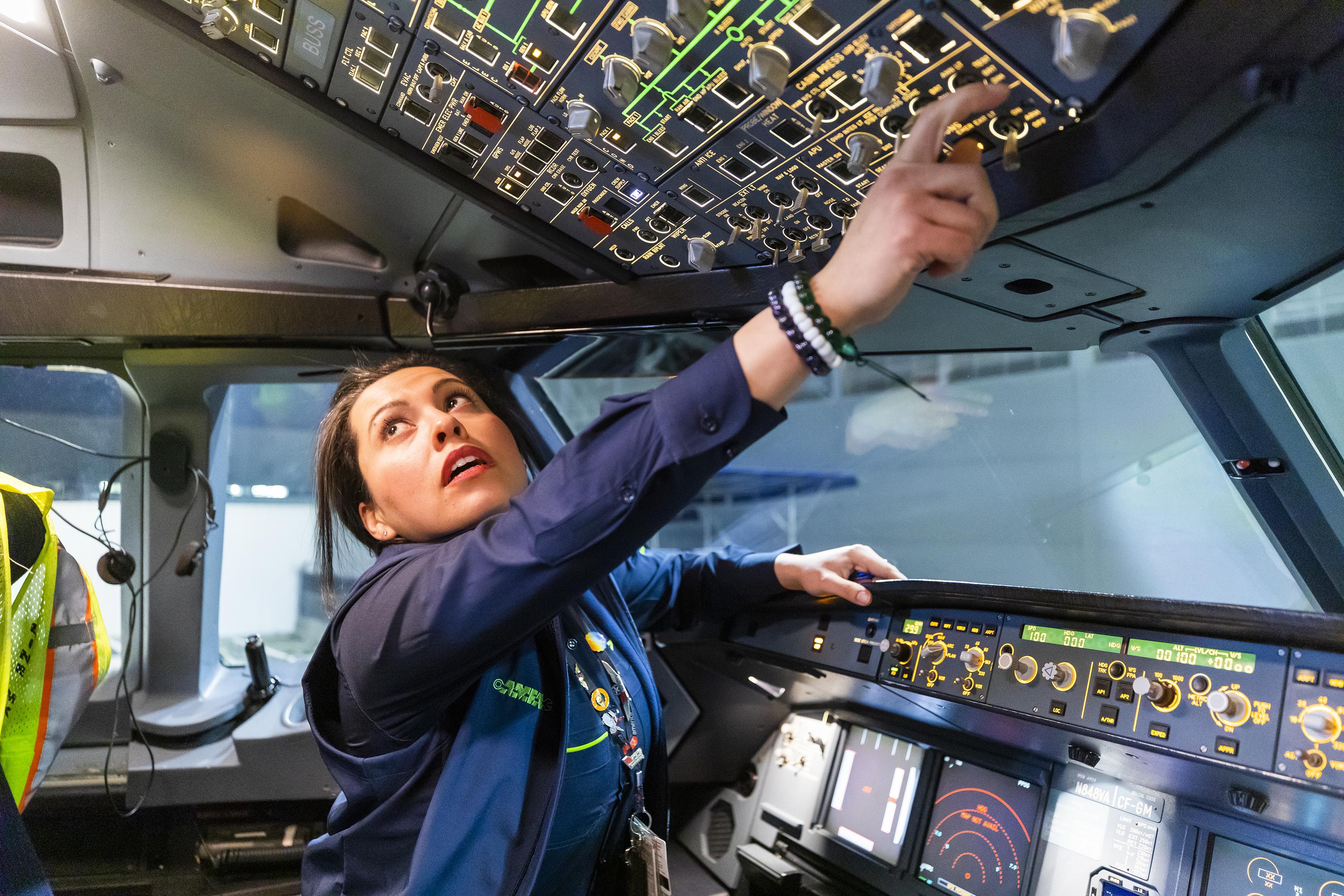 Woman in cockpit of an airplane