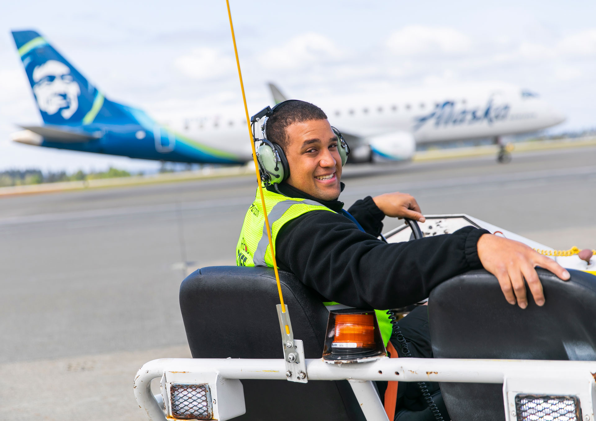 Ground service agent on the runway