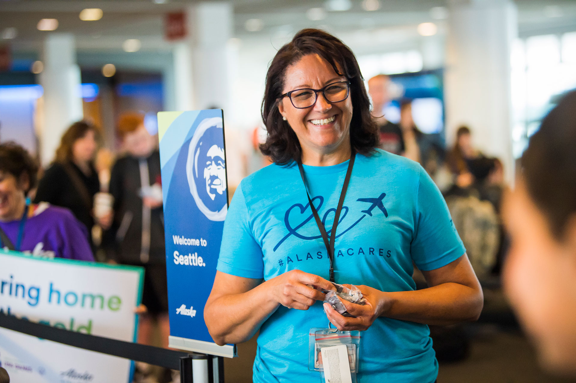 Woman smiling at community event