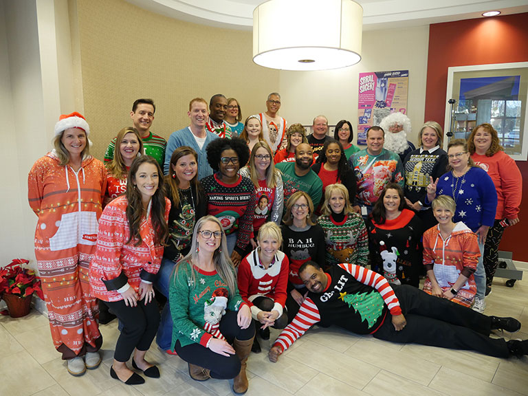 CEO, CFO and many more rocking Ugly Sweaters for our contest